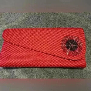 Hand woven red  clutch in perfect new condition